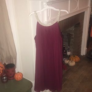 red grecian-looking dress